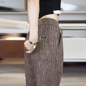 冰丝女士休闲裤春夏季薄款2026新款显瘦束脚长裤子大码潮流运动裤
