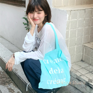 ins风薄荷绿字母帆布包韩系慵懒氛围感托特包薄款外出拍照单肩包