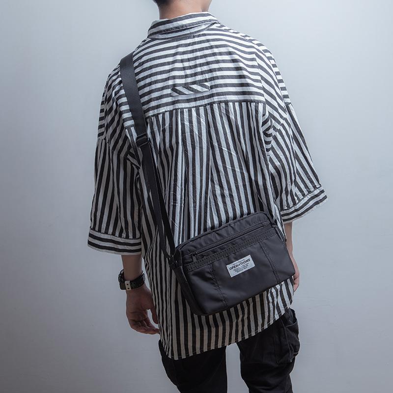 新男款美式街头潮单肩包士斜挎包行包休闲牛津布骑6090小背包流潮