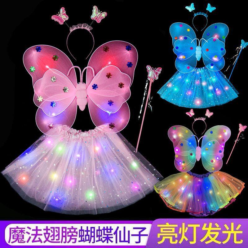 어린이 날 천사 어린 소녀의 뒤로 빛나는 어린이 나비 날개 뒤로 장식 소녀 장난감 요정 스틱