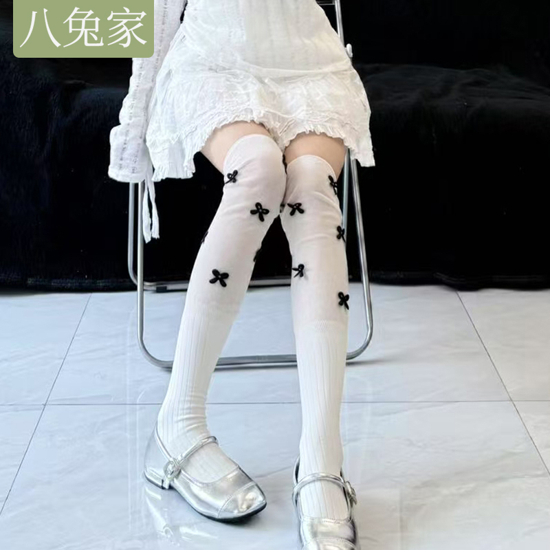 蝴蝶结过膝袜子搭配长筒靴子