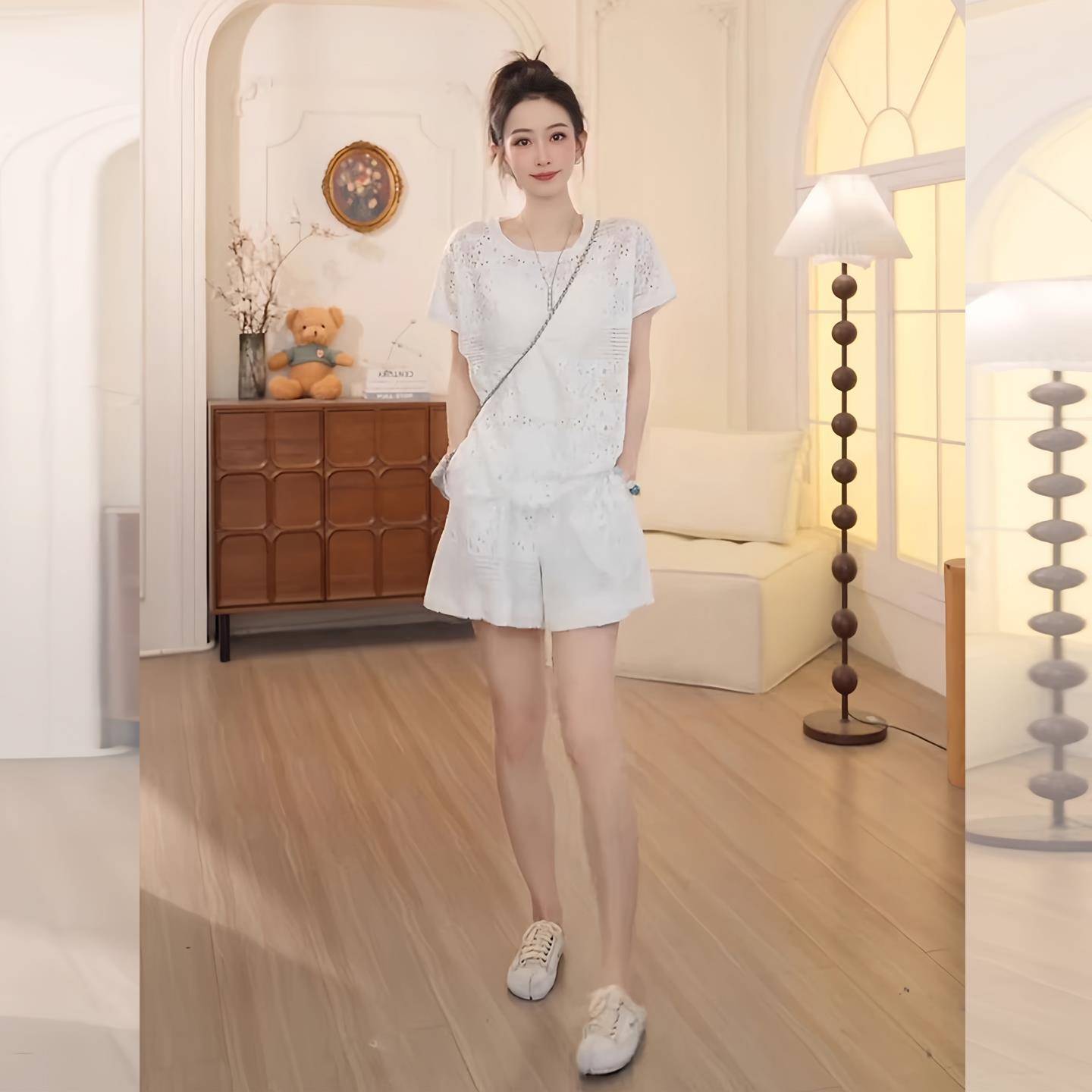 欧洲站运动休闲套装女2025夏季高级感白色镂空上衣阔腿短裤两件套
