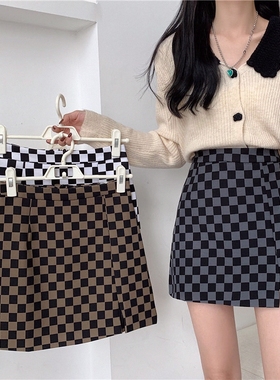 大码女装胖mm包臀半身裙子春秋新款设计感小众棋盘格高腰a字短裙