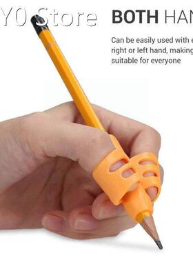 Primary School Students Hold A Pen Orthosis To Train Pen The