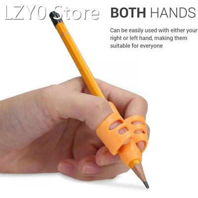 Primary School Students Hold A Pen Orthosis To Train Pen The