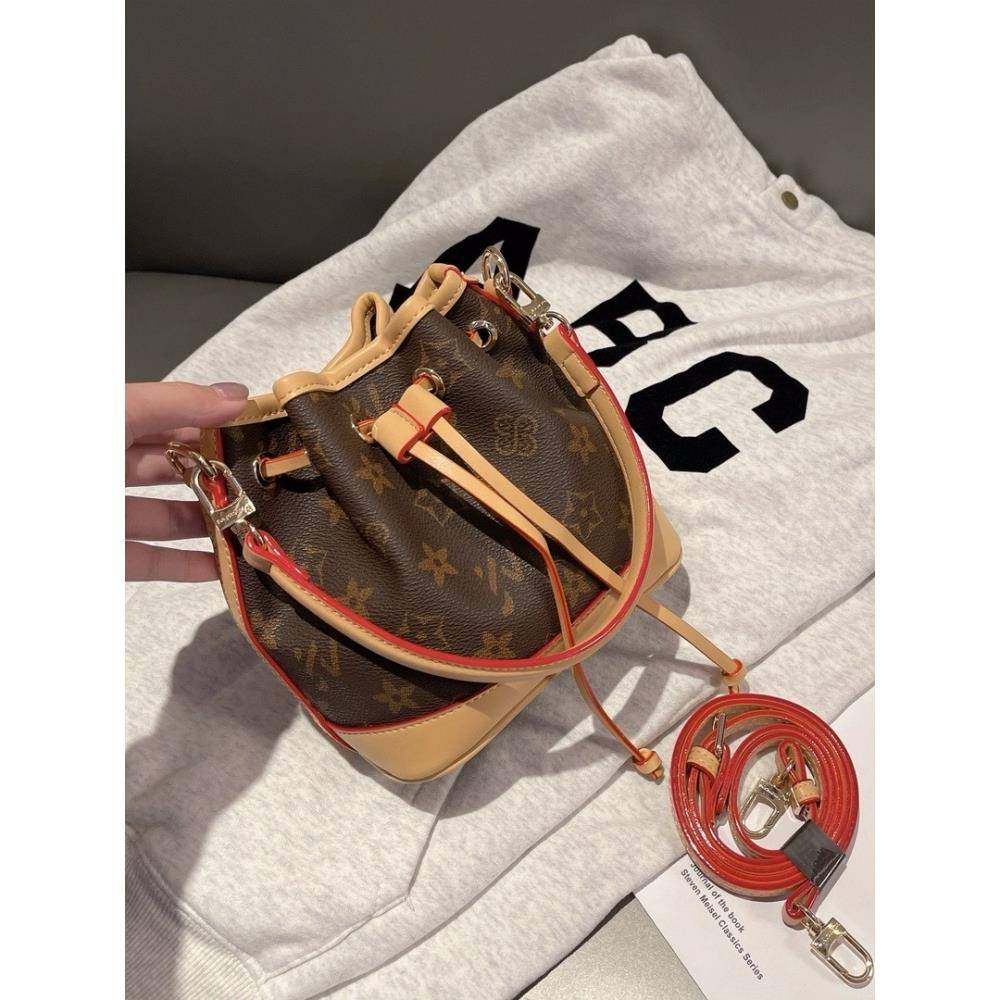 法国DRCO女夏新款时尚百搭单肩斜挎包高级感小众设计抽绳水桶福袋,箱包皮具/热销女包/男包,水桶包,淘宝优惠券,粉丝福利购,淘宝优惠卷