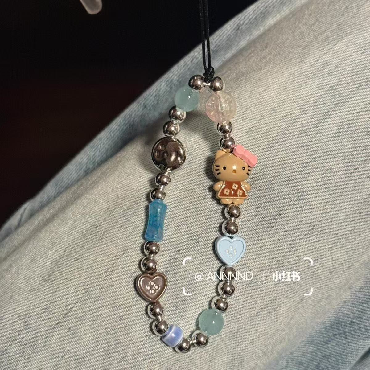 合金猫爱心纽扣手机壳挂绳相机