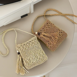 度假风草编包女镂空编织流苏斜挎包手工沙滩包女包时尚潮流单肩包