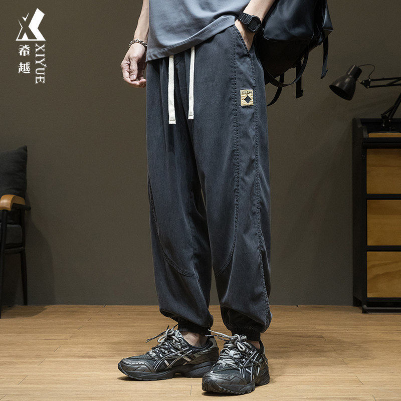 夏季新款天丝凉感休闲裤男士宽松大码胖子肥佬莱赛尔束脚九分裤子