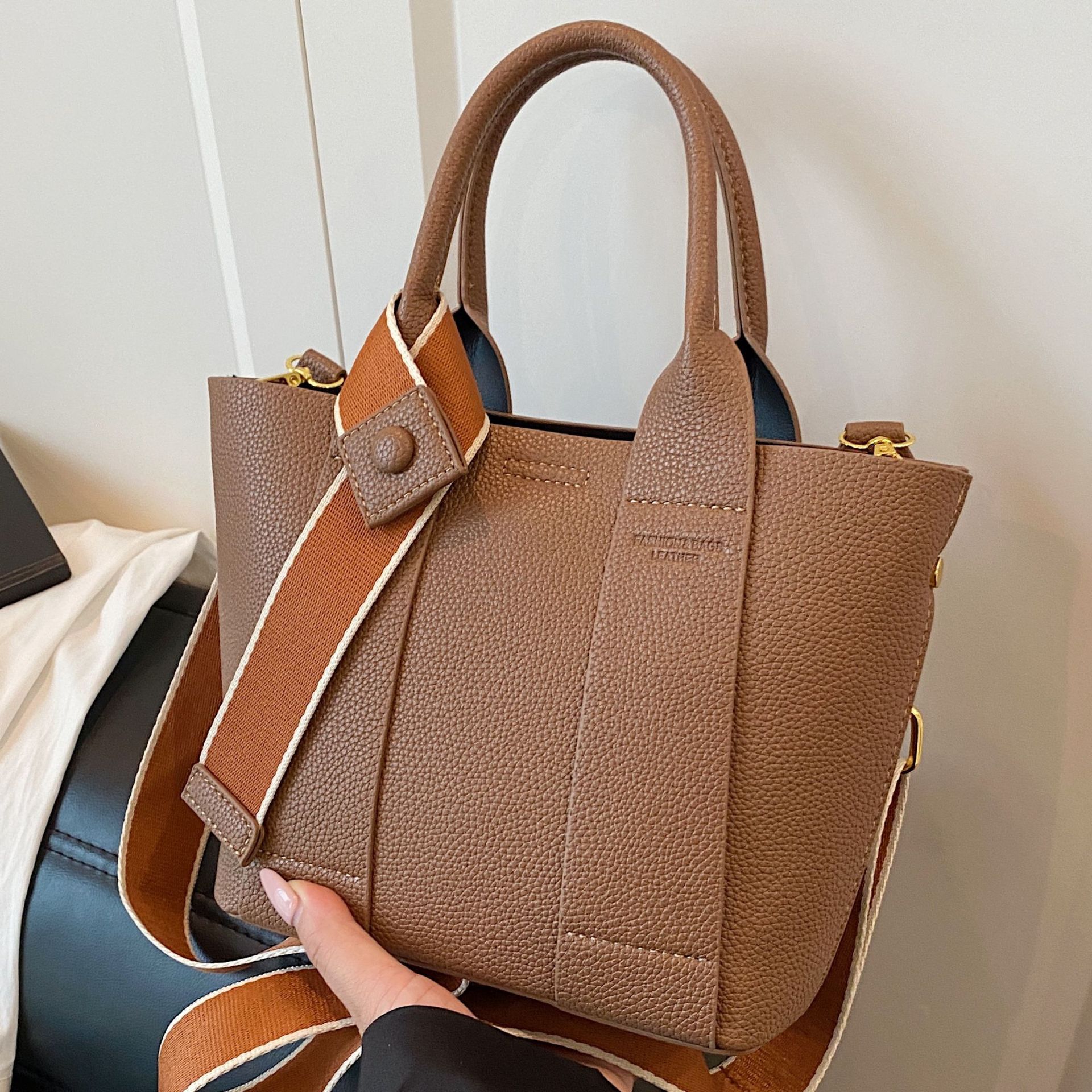 时尚荔枝纹手提2025新款高级感大