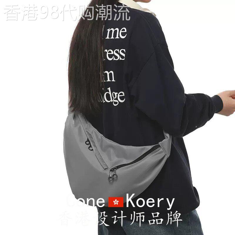 法国斜挎包潮牌休闲运动单肩包男大容量饺子包女机能纯色休闲背包