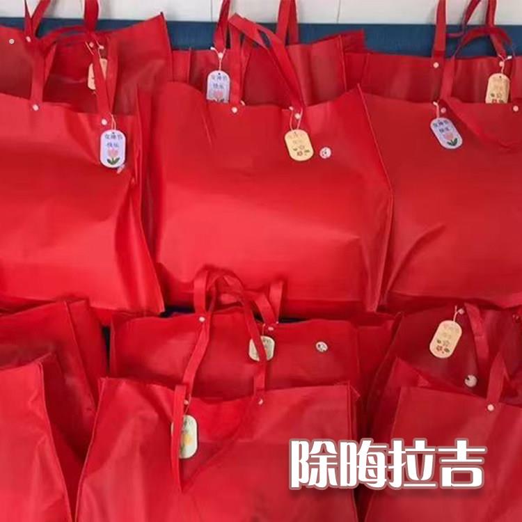 扔旧衣服的红袋子旧衣服处理袋收纳袋无纺布大容量加厚家纺手提袋