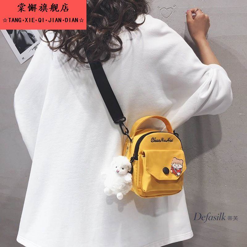 帆布女小包2025新潮流的K-Style多功能手机包覆古风格可爱的学生