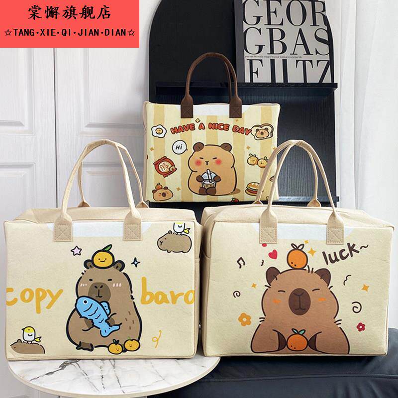 新款卡通毛毡包手提包旅行包收纳袋可爱时尚学生行李箱超大手提袋