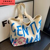 日系字母帆布包包女大容量文艺学生上课手提袋百搭通勤单肩托特包