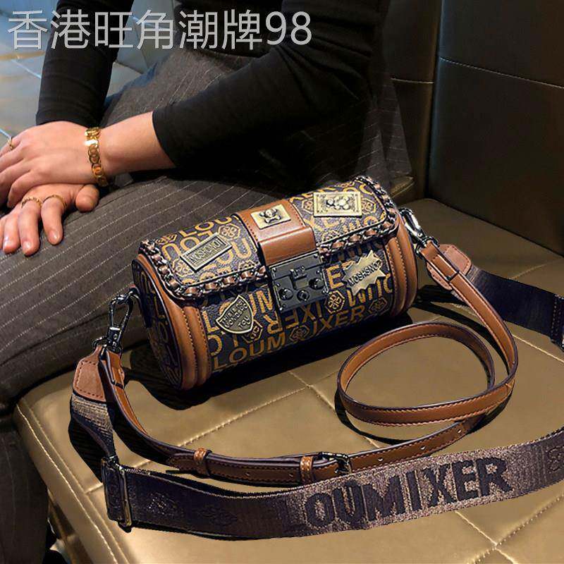 法国Canson Kоck包包女士2025新款徽章圆筒真皮枕头包单肩斜挎包