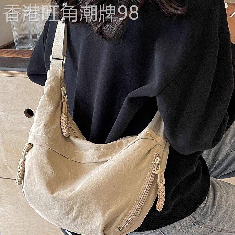 法国斜挎包女包2025新款饺子包女大容量包包女通勤单肩运动百搭包