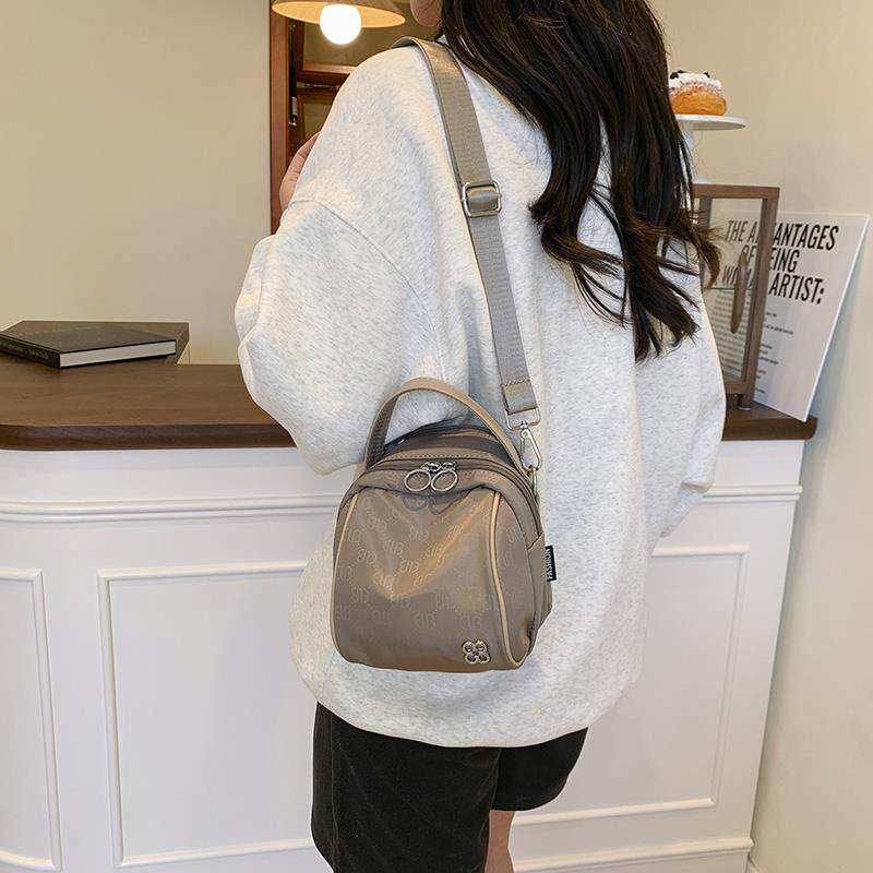 轻便帆布小包包女式2025新款春季流行小圆包小众轻奢斜挎包包