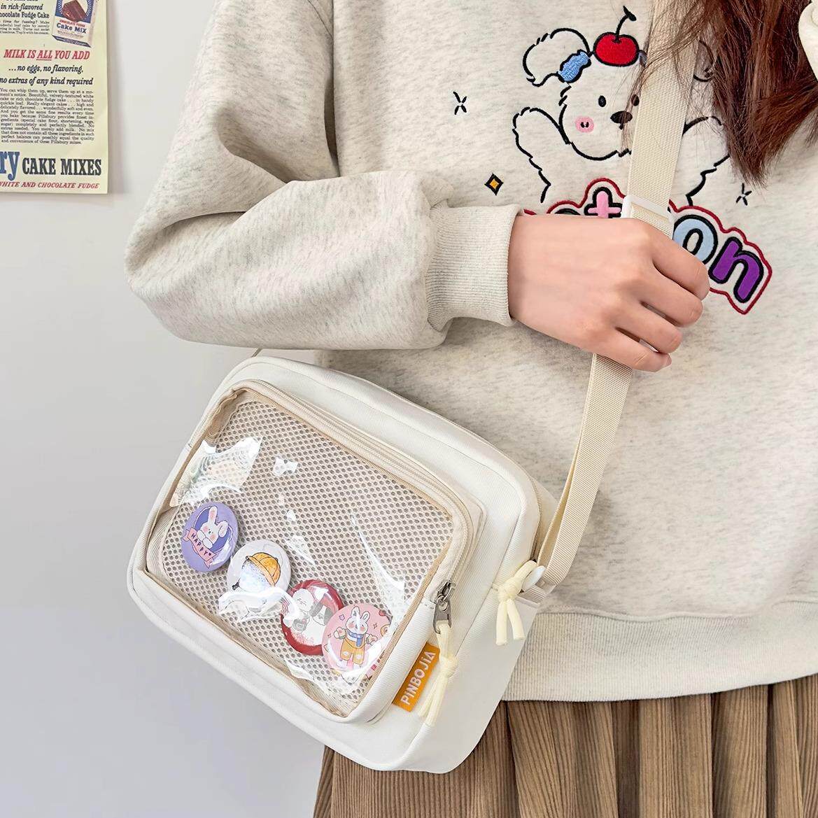 日系ins小斜挎包外出包小食量痛包吧唧包包女孩女童透明轻便