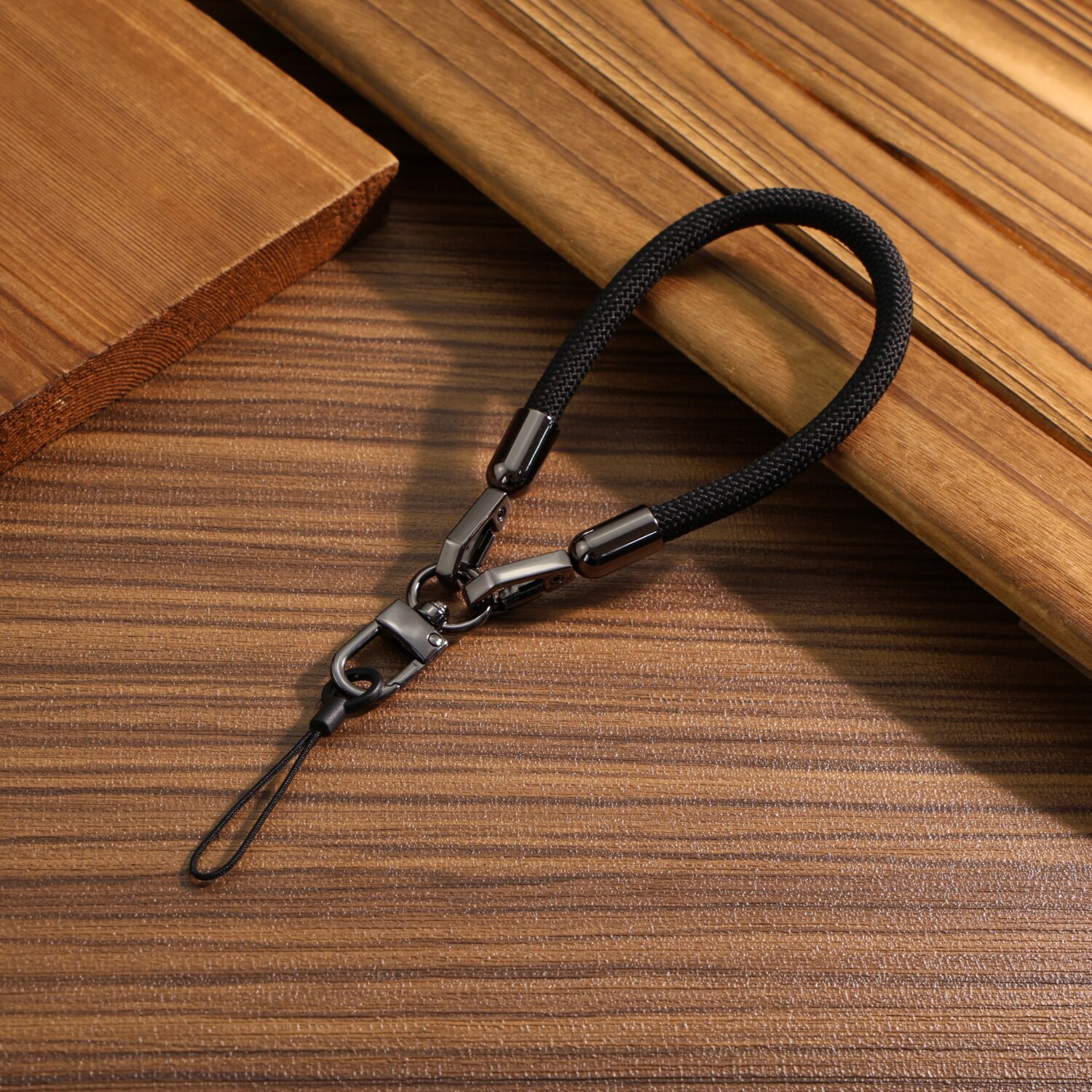 黑色男女通用手机相机耳机零钱包防丢手腕绳包包挂件钩扣车钥匙圈