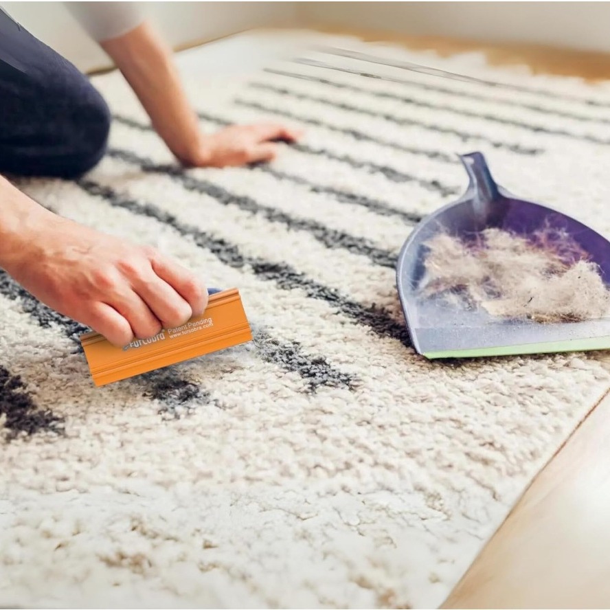 Easy Grip Pet Hair Carpet Scraper held pet hair scraper