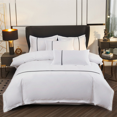 Four piece set of hotel bedding, white duvet cover, complet