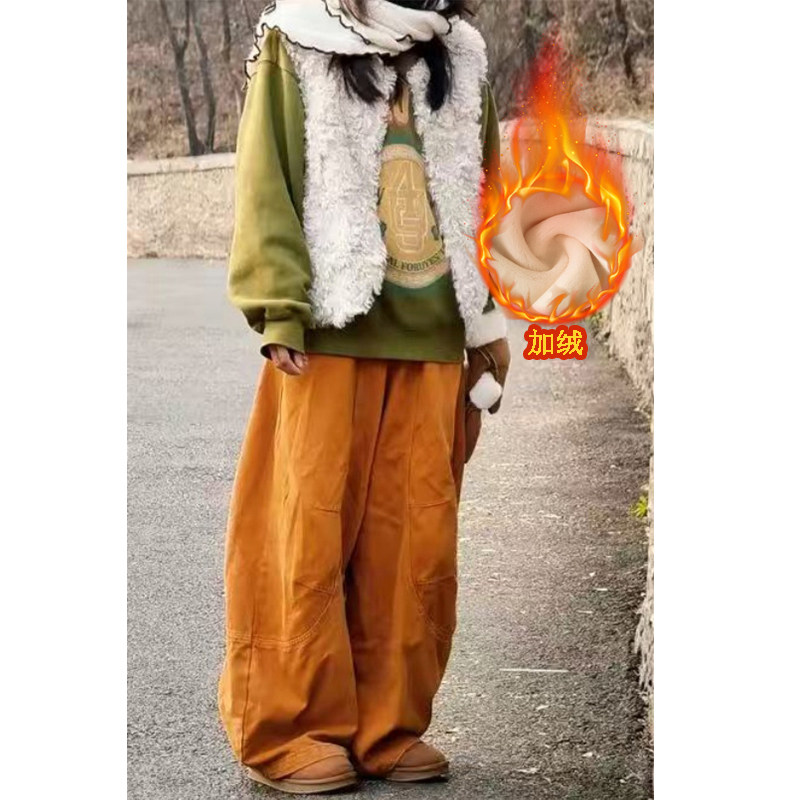 慵懒风橘色加绒弯刀牛仔裤