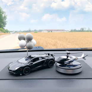 汽车摆件2026新款中控台摆件高档大气旋转香薰车内装饰用品高端