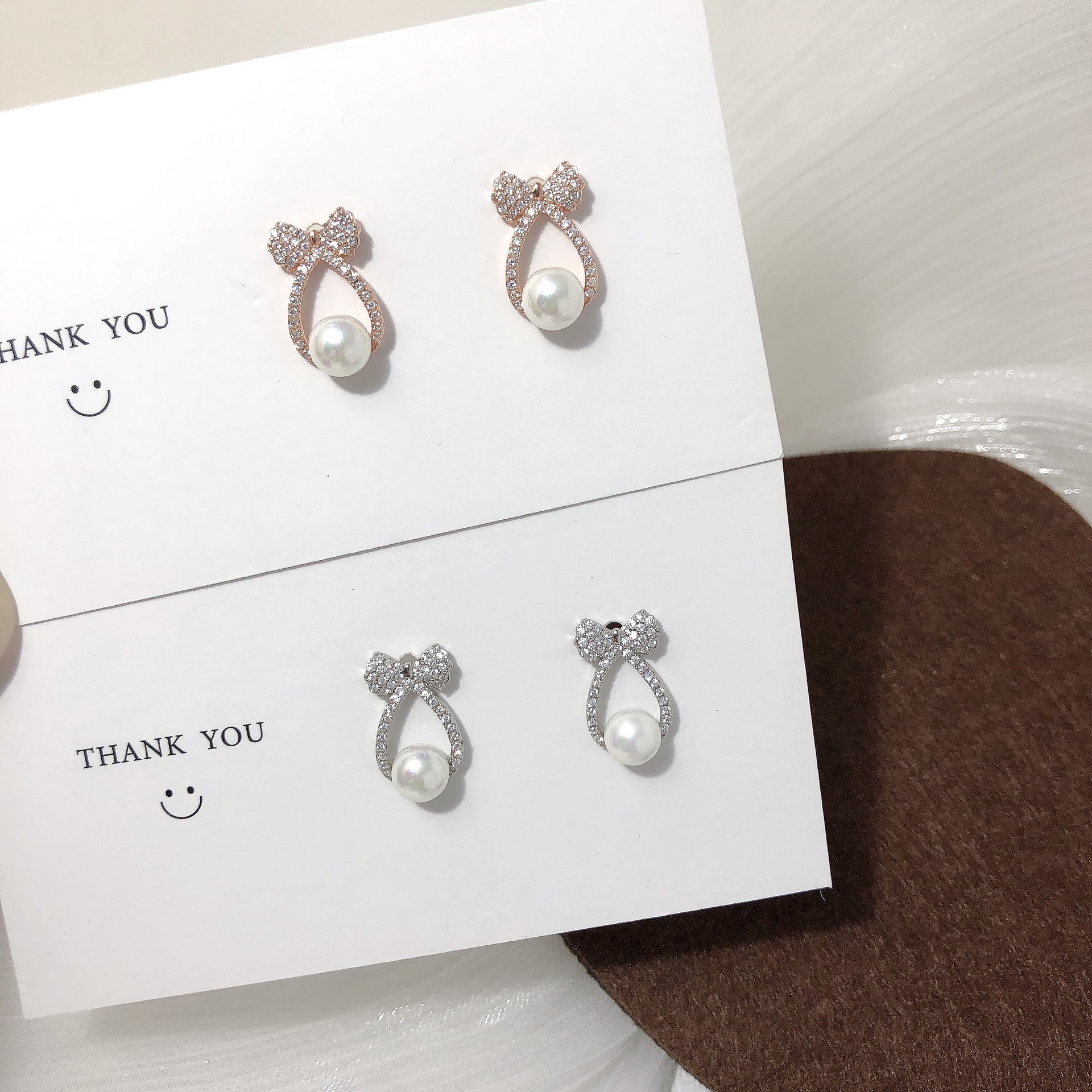 香港正生纯银银饰蝴蝶结珍珠耳钉时尚韩版气质S925纯银耳饰女厂家