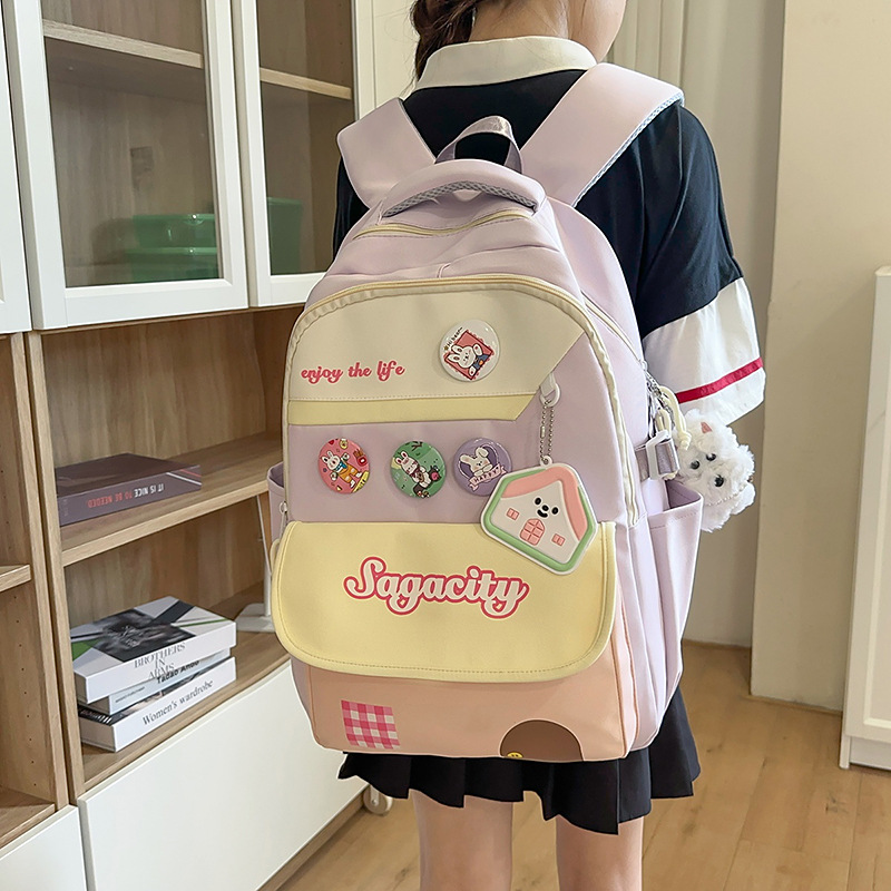书包女初中生小学生三到六年级大容量双肩包简约设计痛包校园