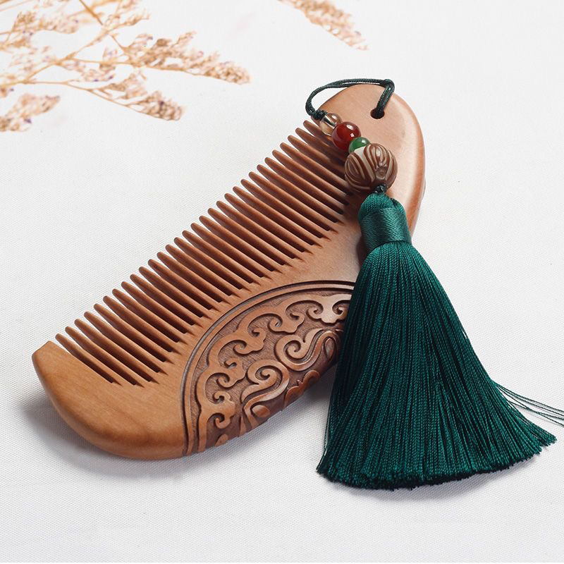 天然桃木梳头皮按摩梳流苏吊坠老料木梳子男女长发专用家用送礼物