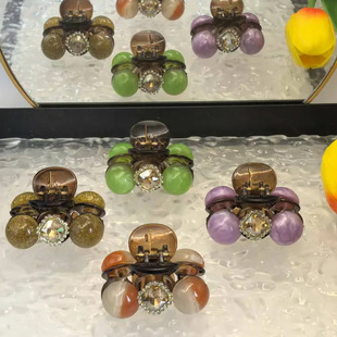 日常低丸子头盘发小抓夹发饰2025新款高级感后脑勺夹子头饰发夹女