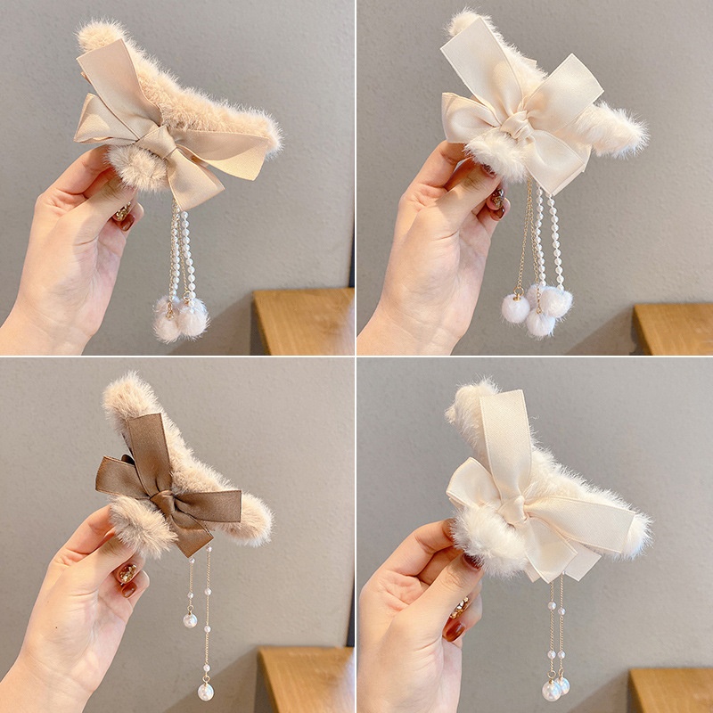 毛绒蝴蝶结流苏抓夹女2025新款感后脑勺盘发鲨鱼夹子发卡头饰