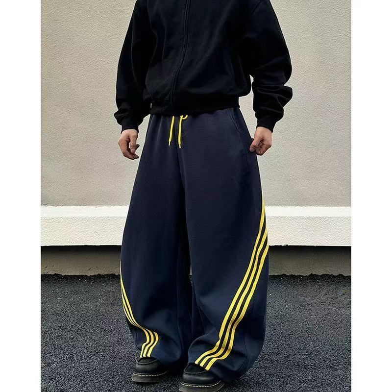 美式休闲弯刀百搭条纹长裤宽松2025年秋季新款休闲裤高街直筒阔腿