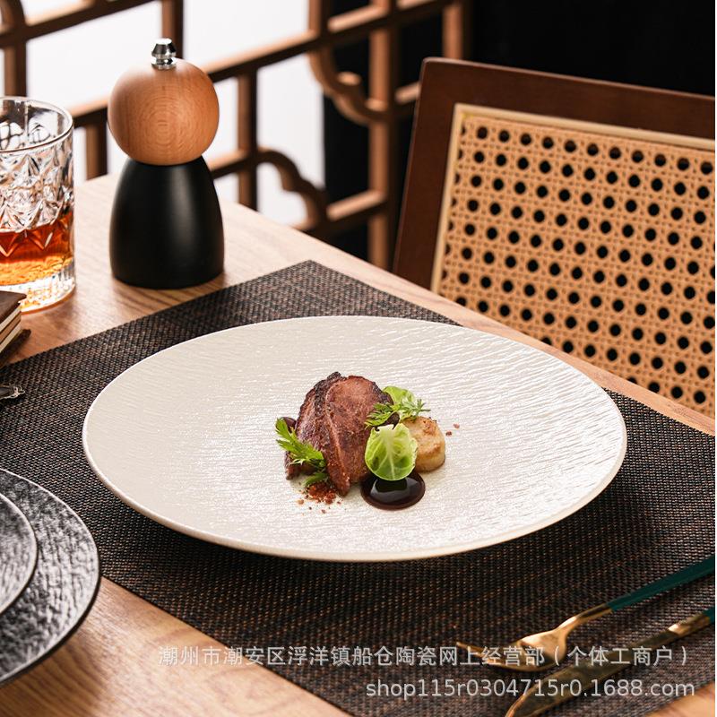 排磨砂纹石陶瓷盘子感ERH浅盘大号西餐盘牛盘盘平盘20圆24新款
