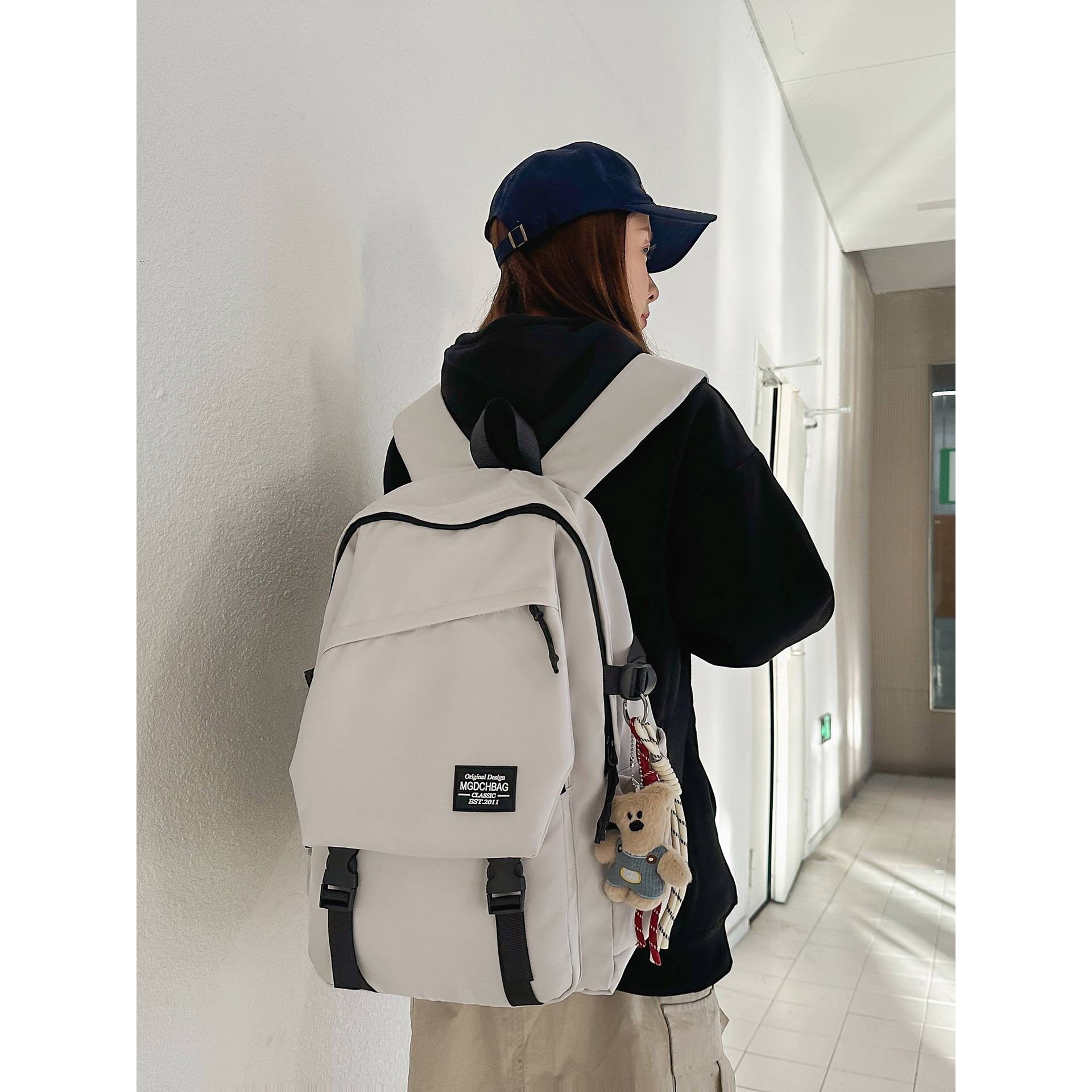 官方正品双肩包男士简约百搭女休闲初高中学生书包大容量旅行电脑