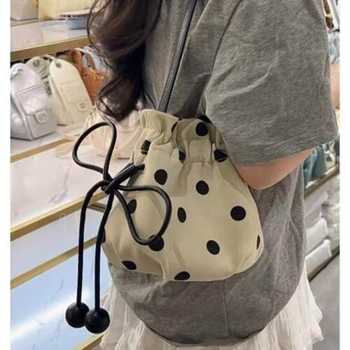 轻奢波点福袋亚麻透气斜挎女包