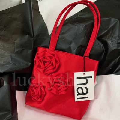 hai花朵手拎腋下黑色迷你小方包