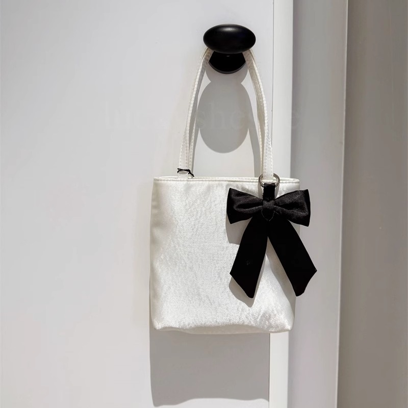 hai丝绸蝴蝶结手提腋下小方包女