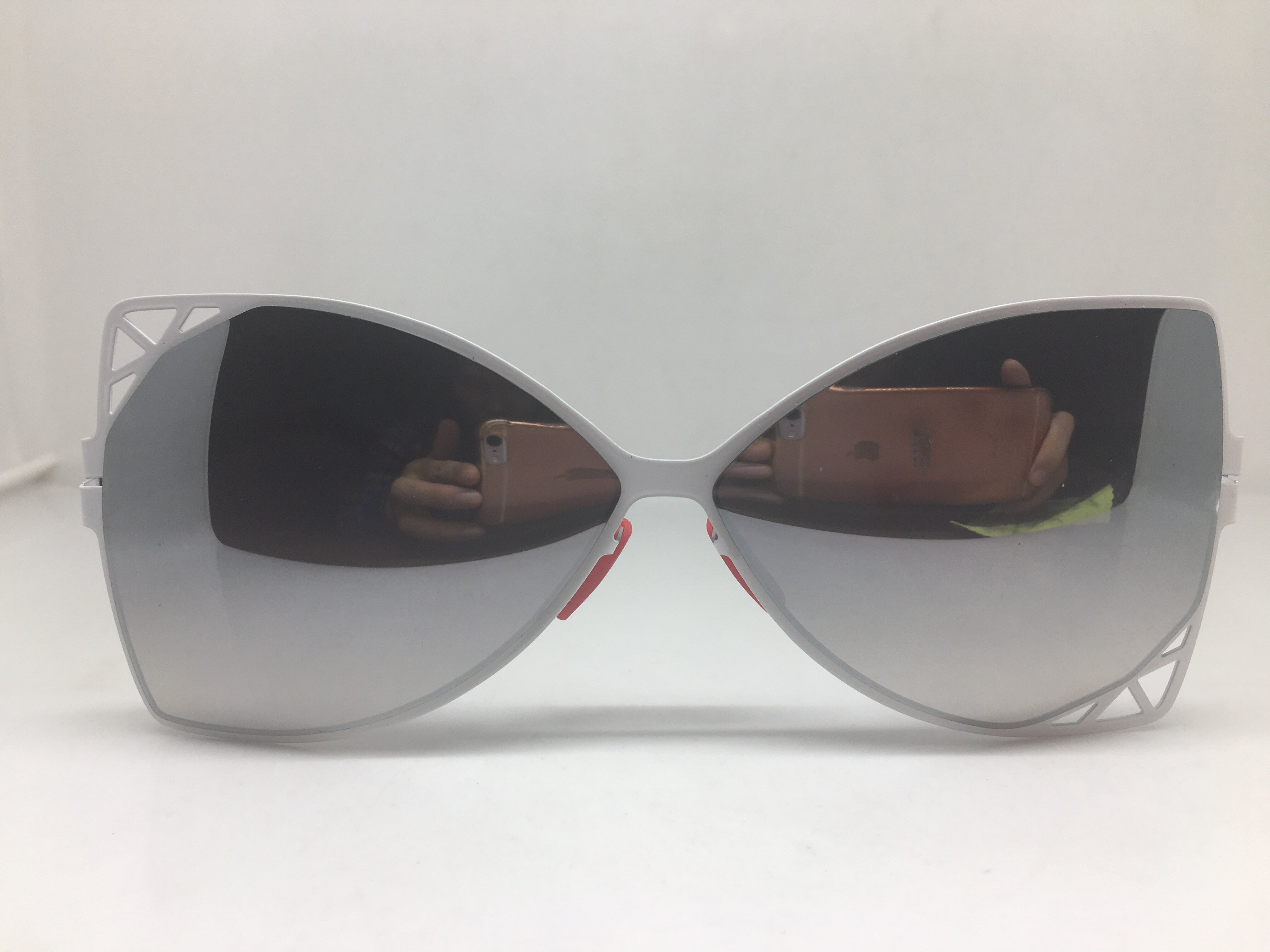 无螺丝白色金属非对称猫眼太阳镜反光镜面墨镜