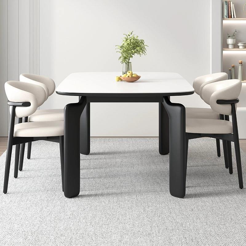 现代简约长方形岩板餐桌椅组合小户型家用大象腿法式复古西餐桌子