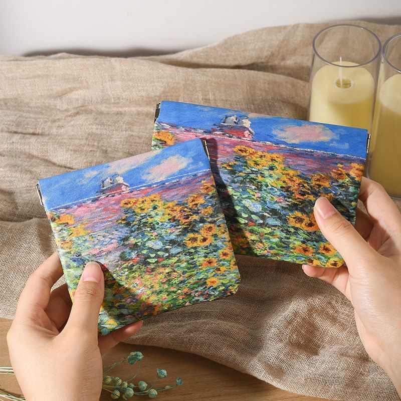 莫奈油画轻奢风化妆包弹片口红收纳包大容量数据线自动闭合耳机包