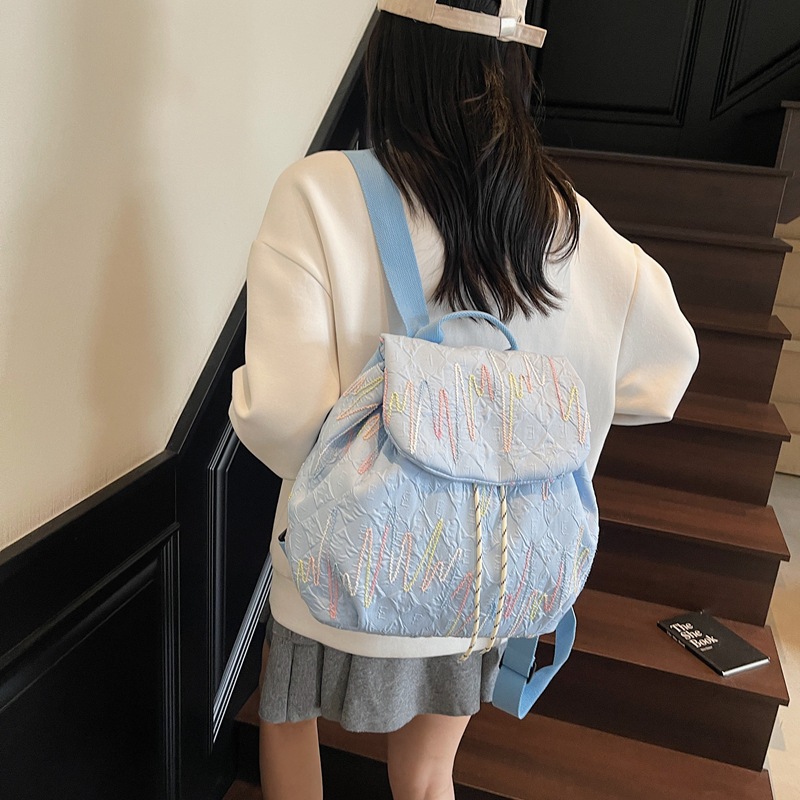 休闲旅行双肩包女2025新款时尚通勤大容量书包大学生轻便手拎背包