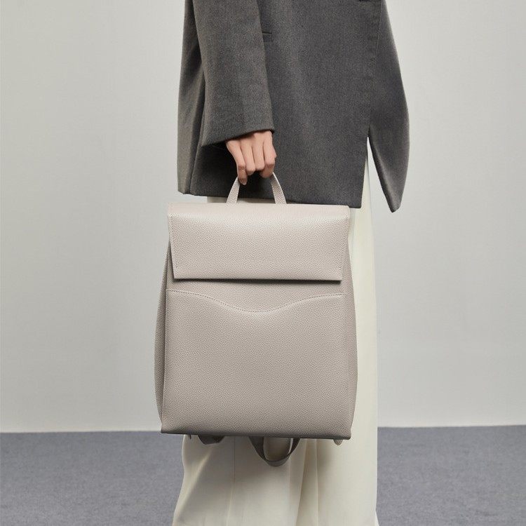 休闲简约通勤双肩包女2025新款小众时尚设计感百搭荔枝纹电脑背包