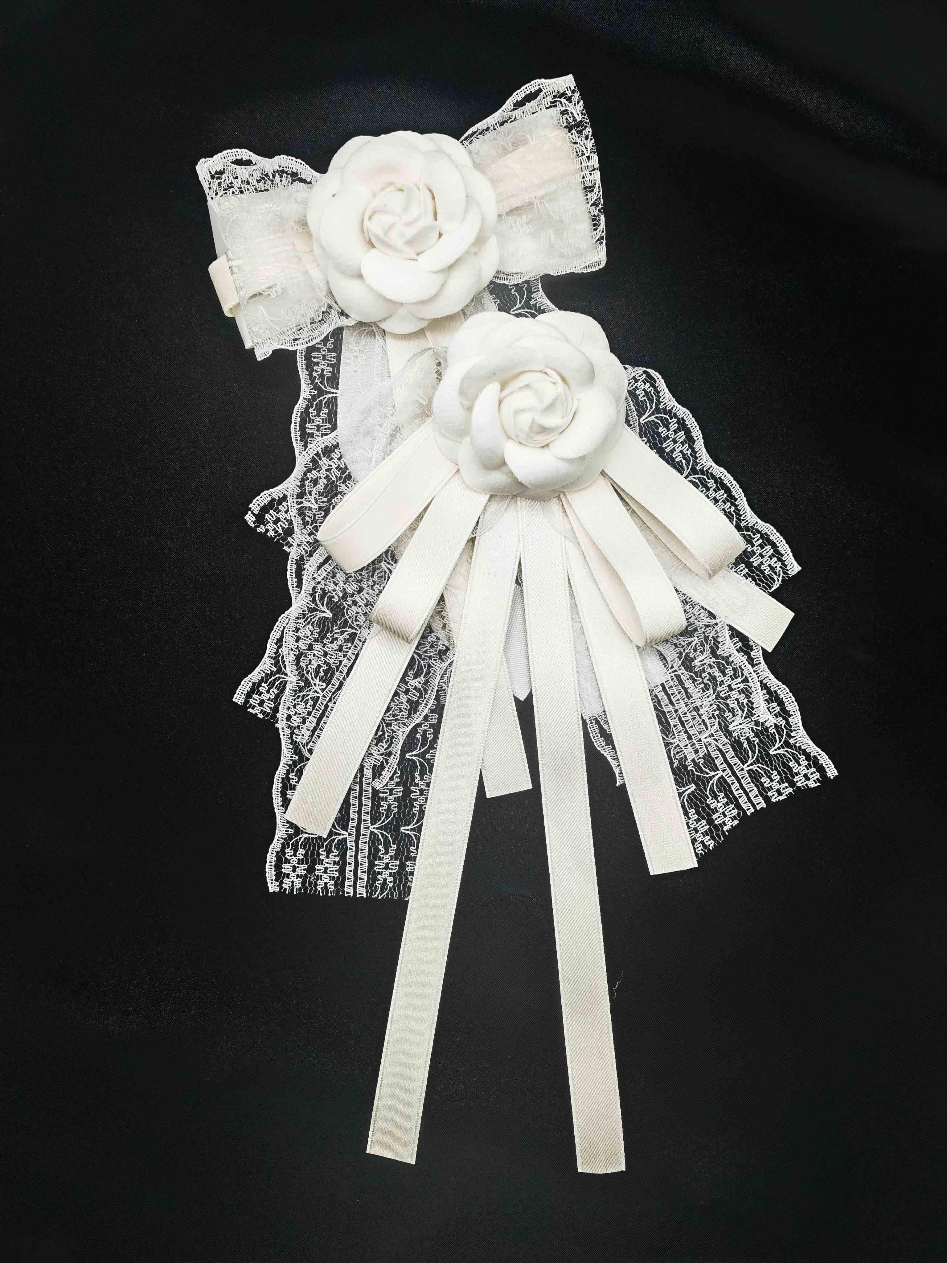 山茶花蕾丝领结小香风