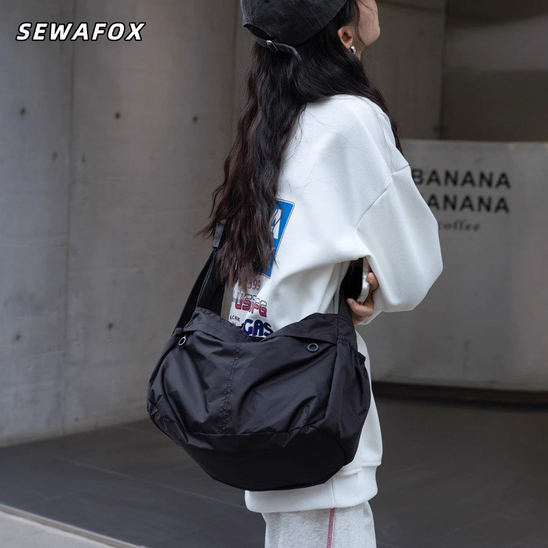 休闲通勤饺子包男女同款大容量时尚单肩包轻便松弛运动旅行斜挎包