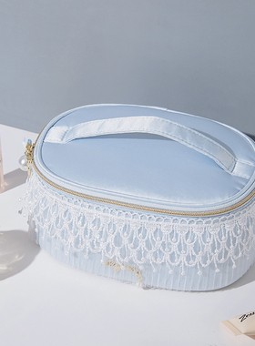 日本蕾丝条纹化妆包2026新款便携旅行多功能手包镂空收纳包高级感