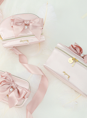 日本Raiponce大蝴蝶结梦幻少女心纯色贝壳包手拿包收纳化妆包便携