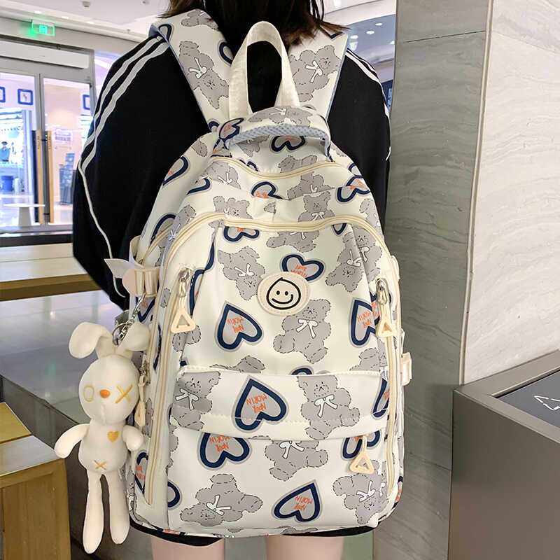 法国Fad Karan减负护脊大容量中学生初中生书包女高中女生双肩包