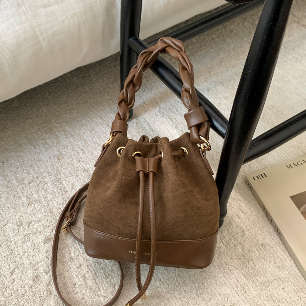 小众麂皮绒水桶包女手提斜挎包